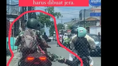 Video pria dengan mengenakan seragam TNI arogan viral karena menendang ibu yang sedang membonceng anak kecil dan kabur.