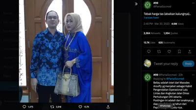 Kepala Bidang Pengendalian Operasional Lalu Lintas dan Angkutan Jalan Dinas Perhubungan DKI Jakarta, Massdes Arouffy bersama sang istri