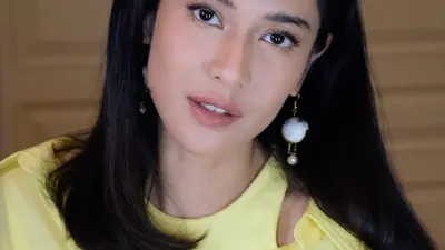 Dian Sastro: Ilustrasi Tanda Wanita punya daya tarik positif