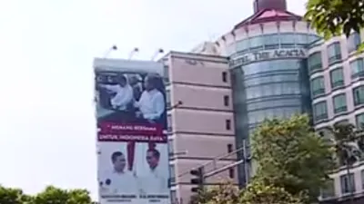 Baliho Gambar Presiden Jokowi dan Capres Prabowo Subianto