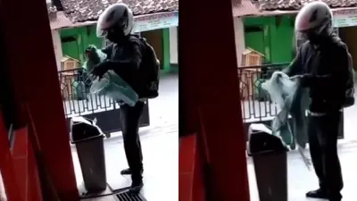 Pria Kesal Merobek Baju