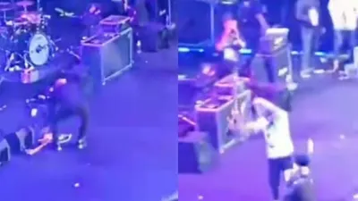 Momen Thomas Ramdhan banting bass di hadapan Ahmad Dhani saat konser di Malaysia.