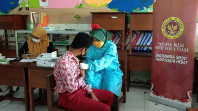 Ilustrasi pelaksanaan vaksinasi anak untuk mencegah Covid-19.