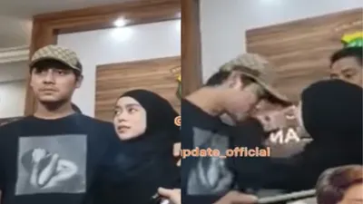 Potret Rizky Billar kembali merangkul dan mencium tangan istrinya Lesti Kejora. (Instagram @insta_julid)