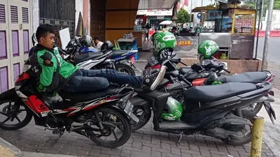 Ilustrasi tarif ojol naik.