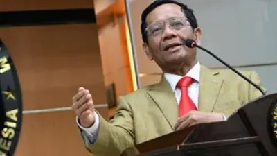 Mahfud MD mengatakan tersangka Tragedi Kanjuruhan akan diumumkan oleh Kapolri Listyo Sigit Prabowo pada Kamis malam, 6 Oktober 2022.