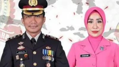 Potret AKBP Aris Rusdiyanto dengan Melani Aris, istri sekaligus Ketua Bhayangkari cabang Muara Enim.