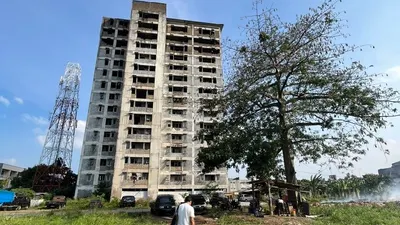 Tampak jauh rumah susun Pengabdi Setan 2