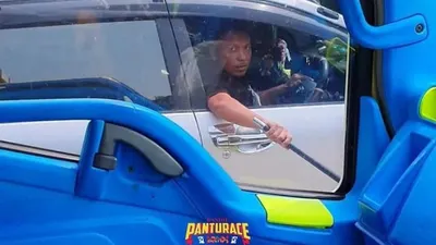 Sopir yang mengacungkan sajam ke sopir truk.