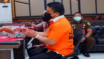  Tersangka kasus pembunuhan Brigadir J, Ferdy Sambo saat diserahkan ke Kejaksaan Agung. 