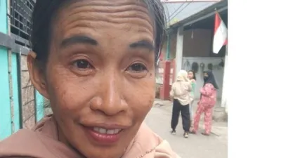 Ani Fina, seorang ibu yang wajahnya mirip dengan Presiden Jokowi