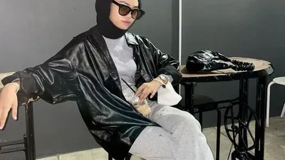 Ilustrasi outfit hijab untuk konser musik.