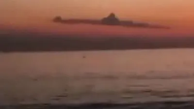 Viral matahari terbit di Sanur Bali muncul awan mirip Kapal Selam KRI Nanggala 402 / dok. Suara.com