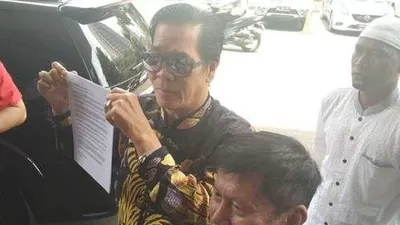 Ketua Persatuan Islam Tionghoa Indonesia Anton Medan di Polda Metro Jaya [suara.com/Agung Sandy Lesmana]