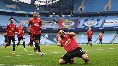 Bruno Fernandes merayakan gol Manchester United saat melawan Manchester City, Senin (8/3/2021), dini hari WIB. (Twitter MU)