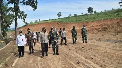 Jalur poros Tengah Timur telah selesai dibuka melalui program karya bakti bersama Kodim 0621 Kabupaten Bogor. (dok)