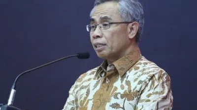 Ketua Dewan Komisioner OJK Wimboh Santoso. (Suara.com/Dian Kusumo Hapsari)