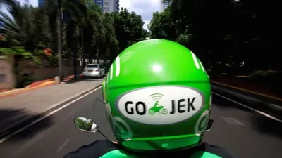 Gojek pada hari ini, Rabu (3/6), resmi mengumumkan investor barunya yakni Facebook, PayPal, Google, dan Tencent.  Foto: Reuters