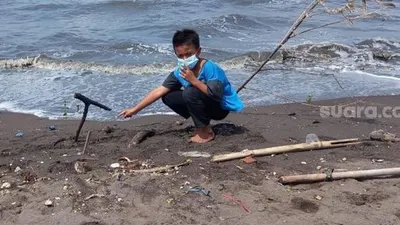 Temuan Bagian Kepala Manusia di Pantai Kis Tanggerang, Diduga Korban Sriwijaya (suara.com)