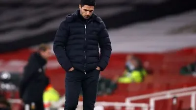 Ekspresi kekecewaan manajer Arsenal, Mikel Arteta dalam laga Liga Inggris 2020/2021 kontra Wolves di Emirates Stadium, Senin (30/11/2020) dini hari WIB. [JULIAN FINNEY / POOL / AFP]