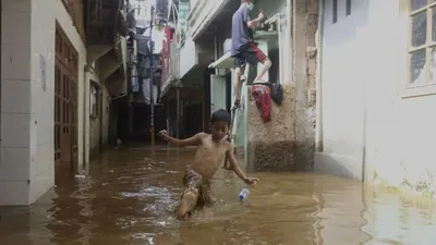 ilustrasi banjir di Jakarta/ Suara.com