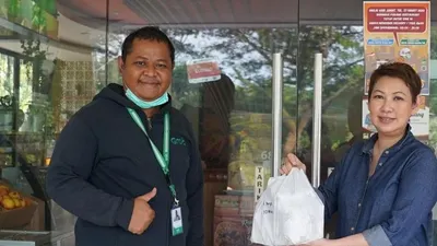 Partner Acquisition & Donation Div Grab, Herudin dan Sioe Bie, Direktur PT Bhinneka Padang Resto