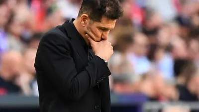 Pelatih Atletico Madrid, Diego Simeone. [GABRIEL BOUYS / AFP]