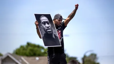 Poster foto George Flyod saat demo antirasial di Amerika Serikat