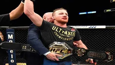 Justin Gaethje menerima sabuk juara kelas ringan interim UFC setelah mengalahkan Tony Ferguson, Minggu (10/5/2020). - (Dok. UFC)