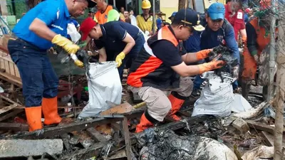 Suasana kerja bakti di Kampung Makassar, Jakarta Timur, Minggu (5/1/2020) (Dispen Lantamal III)