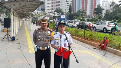 Kepala Dinas Perhubungan DKI Jakarta Syafrin Liputo dan Dirlantas Polda Metro Jaya Kombes Pol. Yusuf saat konferensi pers di Dukuh Atas/Ayojakarta.com