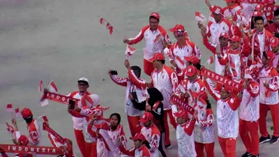 Kontingan Indonesia melakukan defile dalam pembukaan SEA Games 2019 di Philippine Arena, Bulacan, Filipina, Sabtu (30/11/2019). (Pikiran Rakyat/Nyoman Budhiana)