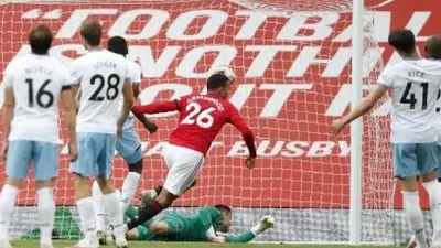 Striker Manchester United Mason Greenwood merayakan golnya ke gawang West Ham United dalam lanjutan Liga Inggris di Old Trafford. Clive Brunskill / POOL / AFP