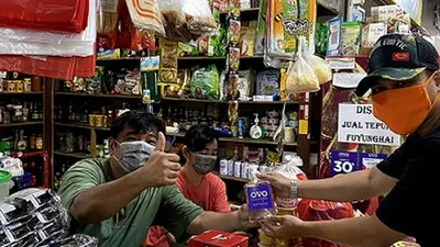 OVO Bagikan 10.000 Pembersih Tangan kepada Merchant