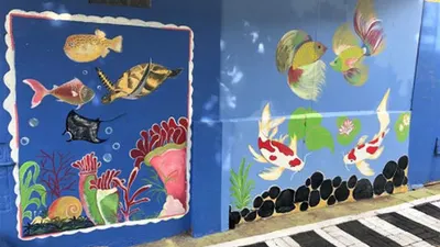 Mural di permukiman warga Pulau Untung Jawa (Beritajakarta.id)