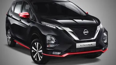 Tampilan haluan Nissan Livina Sporty Package.Dominan hitam dengan aksen merah yang keren (Nissan Indonesia).