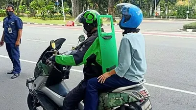 Alat pelindung diri (APD) ala pengemudi ojek online alias ojol/dok. pribadi Igun Wicaksono