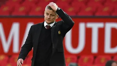 Ekspresi kekecewaan manajer Manchester United, Ole Gunnar Solskjaer pada laga Liga Inggris 2020/2021 kontra Tottenham Hotspur di Old Trafford, Manchester, Minggu (4/10/2020) malam WIB. [Oli Scarff / AFP]
