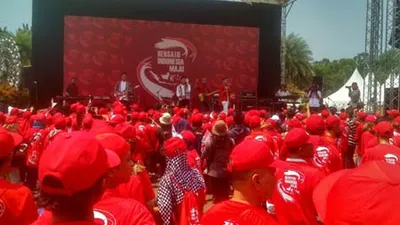 Hiburan panggung dari grup band RAN di depan patung kuda, Jakarta Pusat, Minggu (20/10/2019)/Ayojakarta.com