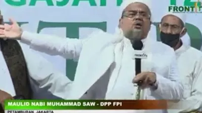 Habib Rizieq Shihab di acara Maulid Nabi dan pernikahan putrinya Najwa Shihab di Petamburan, Jakarta Pusat, Sabtu (14/11/2020) malam. [Suara.com/Bagaskara Isdiansyah]