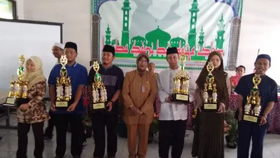Qori dan qoriah Kepulauan Seribu Selatan meraih juara lomba MTQ ke-28 tingkat kabupaten/pulauseribu.jakarta.go.id
