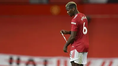 Reaksi Gelandang Manchester United, Paul Pogba pada laga Liga Primer Inggris melawan Arsenal di Old Trafford, Senin (2/11) dini hari WIB. United kalah 0-1.  Foto: EPA-EFE/Paul Ellis