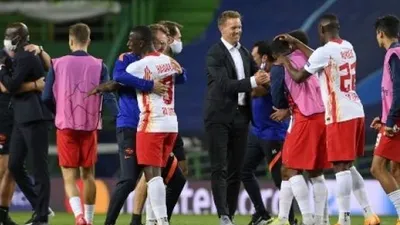 Selebrasi Julian Nagelsmann usai mengantar RB Leipzig lolos ke semifinal Liga Champions. (LLUIS GENE / POOL / AFP)