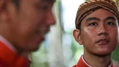 Siluet Presiden Jokowi dan Gibran Rakabuming Raka
