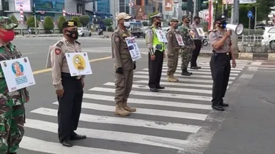 Sanksi Tegas Incar Polisi dan TNI Tak Bermasker