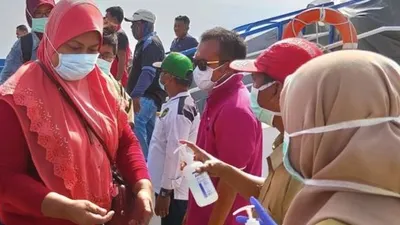 Sebagai ilustrasi, para TKI di Kepulauan Bawean, Gresik (Suara.com)