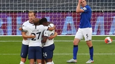 Para pemain Tottenham Hotspur merayakan gol. Catherine Ivill / POOL / AFP