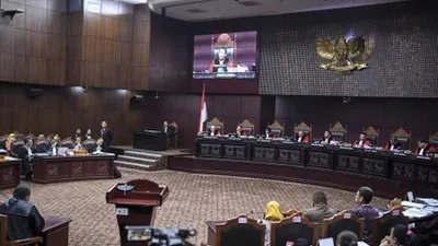 Suasana sidang perdana Perselisihan Hasil Pemilihan Umum (PHPU) sengketa Pilpres 2019 di Mahkamah Konstitusi, Jakarta, Jumat (14/6/2019). ANTARA FOTO/Hafidz Mubarak A/wsj.
