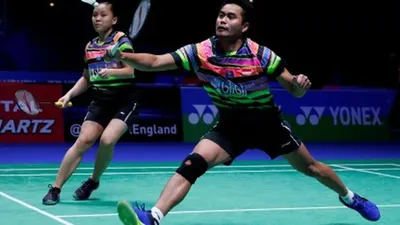 Ilustrasi--Ganda campuran Indonesia Tontowi Ahmad (kanan) dan Winny Oktavina Kandow beraksi dalam babak perempat final kejuaraan bulutangkis All England melawan pasangan Jepang Arisa Higashino/Yuta Watanabe, di Birmingham Arena, Inggris, Jumat (8/3/2019). ANTARA FOTO/Reuters/Andrew Boyers/ama.