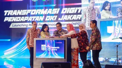 Gubernur DKI Jakarta, Pramono Anung secara resmi meluncurkan Modul Penerimaan Daerah (MPD) dalam acara Transformasi Digital Pendapatan DKI Jakarta pada Kamis (18/12). (Sumber: beritajakarta.id | Foto: beritajakarta.id)